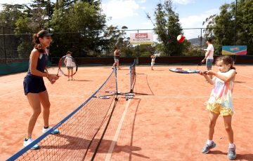PRIZE: Mihaela Buzarnescu meets a young fan at Hobart International 2019. A player meet and greet is among the prizes on offer for Tasmanian Tennis Award winners; Getty Images