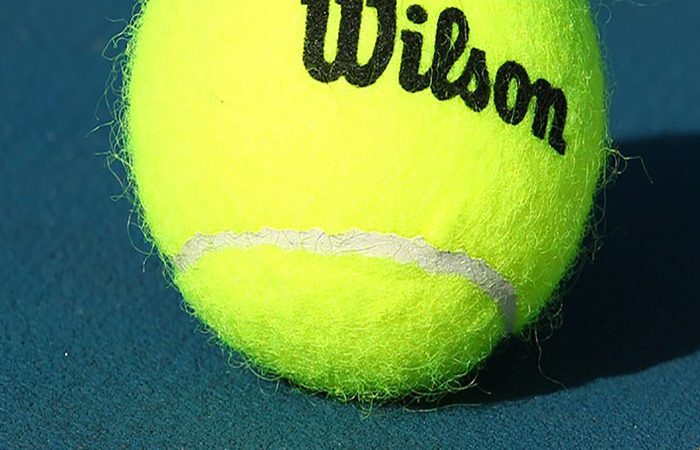 tennis-ball-on-court 700x450