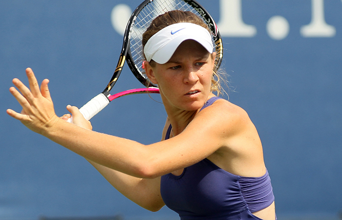NEW YORK, NY - AUGUST 27:  Olivia Rogowska of Australia return a shot against  Mandy Minella of Luxembourg during their women's singles first round match Day One of the 2012 US Open at USTA Billie Jean King National Tennis Center on August 27, 2012 in the Flushing neigborhood of the Queens borough of New York City.  (Photo by Alex Trautwig/Getty Images)