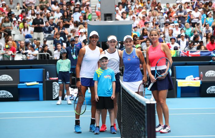MELBOURNE, AUSTRALIA - JANUARY 23: Ashleigh Barty of Australia and Julia Goerges of Germany and Jessica Moore and Astra Sharma of Australia on day four of the 2020 Australian Open at Melbourne Park on January 23, 2020 in Melbourne, Australia. (Photo by Hannah Peters/Getty Images)