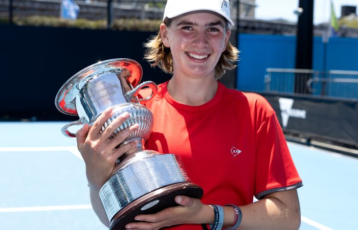 Sara Nikolic with the trophy for winning the 14/u Singles Final during the 14/u December Showdown Finals at Melbourne Park on Saturday, December 10, 2022. MANDATORY PHOTO CREDIT Tennis Australia/ FIONA HAMILTON