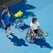 Coach Greg Crump passes on some tips to wheelchair tennis player Sarah Calati; TENNIS AUSTRALIA