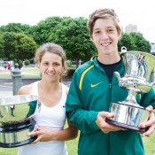 The Harris siblings, Samantha (left) and older brother Andrew celebrate winning the girls' and boys' Optus 16s Australian Championships titles.