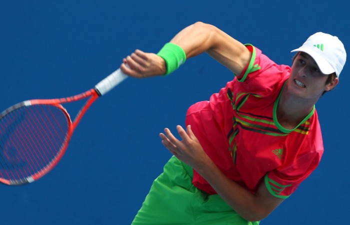 Joey Swaysland serves during his second match match at the 2011 Australian Open juniors' tournament.