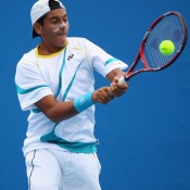 Nick Kyrgios plays a backhand in his second match match at the 2011 Australian Open juniors' tournament.