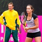 13th of April 2011. Dave Taylor watches Jarmila Groth at practice ahead of the Australia v Ukraine Federation Cup tie. Mark Riedy.