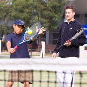 10th of May 2011. Todd Woodbridge watches Chase Ferguson at the Longines Future Tennis Aces launch. Mark Riedy.