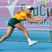 Zoe Hives stretches for a backhand during her win in the opening singles rubber of the Australia v China Junior Fed Cup Asia/Oceania qualifying competition; Bill Conroy
