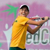 Zoe Hives enjoys a lighter moment during her doubles match with Isabelle Wallace against Malaysia; Bill Conroy