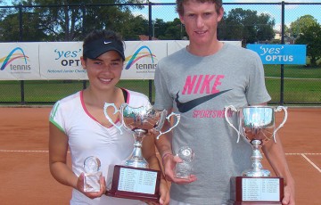 Isabelle Wallace (L) and Harry Bourchier hold their trophies after winning the singles titles at the Optus 16s National Claycourt Championships in Ipswich; Tennis Australia