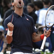 Serbia's Novak Djokovic celebrates after defeating Roger Federer 6-4 7-5 6-3 in the semifinals of the French Open, revenge for his loss to the Swiss at the same stage of last year's tournament in Paris; Getty Images