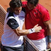 Spain's Rafael Nadal (R) commiserates with compatriot David Ferrer after defeating Ferrer in the semifinals of the French Open; Getty Images