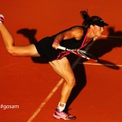 Samantha Stosur of Australia serves in her women's singles fourth round match against Sloane Stephens of USA during day 8 of the French Open at Roland Garros on June 3, 2012 in Paris, France; Getty Images