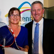 Senator the Honourable Kate Lundy, Minister for Sport, Minister for Multicultural Affairs, Minister Assisting for Industry and Innovation receives a tennis racquet signed by Samantha Stosur from Tennis Australia CEO Steve Wood at the 2012 Australian Tennis Conference. Mark Riedy.