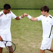 Aussies Nick Kyrgios (L) and Andrew Harris celebrate a winning point during the boys' doubles event at Wimbledon; Getty Images