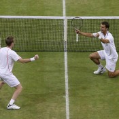 Jonathan Marray of Great Britain (L) and Frederik Nielsen of Denmark celebrate winning match point in the gentlemen's doubles final against Robert Lindstedt of Sweden and Horia Tecau of Romania at Wimbledon; Getty Images