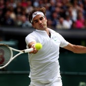 Roger Federer plays a forehand against Andy Murray during the men's singles final at Wimbledon; Getty Images