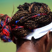 Venus Williams takes American pride to another level, braiding her hair in her country's colours as she competes in the Olympic tennis event. She fell in the third round of the women's singles to German Angelique Kerber; Getty Images
