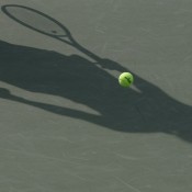 A shadow is cast across the court as Caroline Wozniacki serves during her match against Arantxa Rus of Netherlands at the KDB Korea Open in Seoul; Getty Images