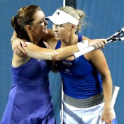 Agnieszka Radwanska (L) of Poland and Caroline Wozniacki of Denmark hug after their quarterfinal match at the Toray Pan Pacific Open in Tokyo, Japan. Radwanska won 6-4 6-3; Getty Images