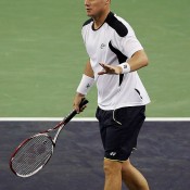 Lleyton Hewitt apologises during his first round loss to Radek Stepanek at the Shanghai Rolex Masters at the Qi Zhong Tennis Center; Getty Images