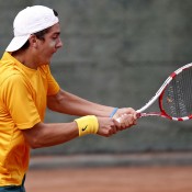Thanasi Kokkinakis in action during the semifinals of the Junior Davis Cup world finals; photo Srdjan Stevanovic