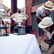 Fans inspect the Australian Open trophies in the Asakusa district in Taitō, Tokyo, as part of the AO Trophy Tour; Keith Tsuji