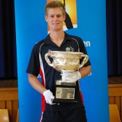 Luke Saville poses with the Norman Brookes Challenge Cup in Canberra; Tennis Australia 