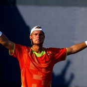 Lleyton Hewitt of Australia celebrates defeating Gilles Muller in five gruelling sets in the second round of the 2012 US Open; Getty Images