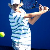 Kody Pearson in action during the 2014 16/u Australian Championships at Melbourne Park; Mae Dumrigue