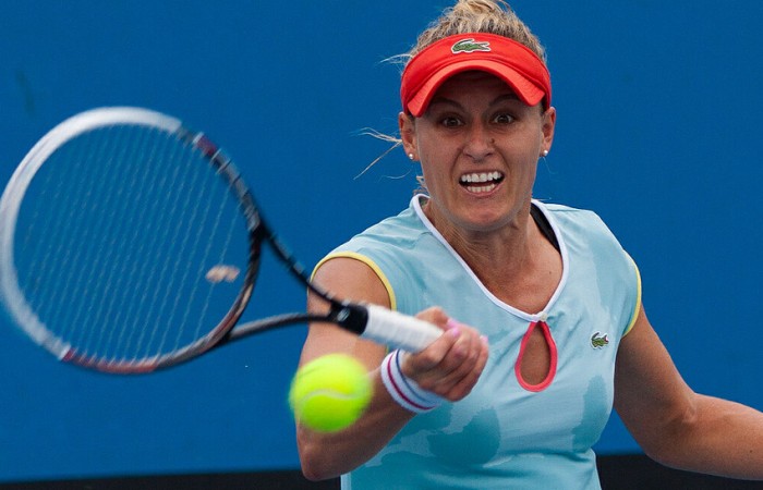 Monique Adamczak in action at the Australian Open 2013 Play-off at Melbourne Park; Matt Johnson