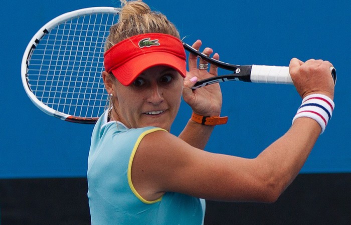 Monique Adamczak on her way to defeating Viktorija Rajicic in the quarterfinals of the Australian Open 2013 Play-off at Melbourne Park; Matt Johnson