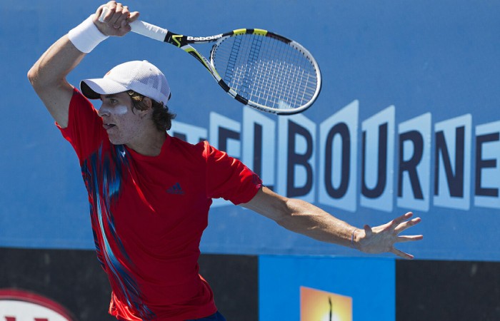 Ben Mitchell in action at the Australian Open 2013 Play-off at Melbourne Park; Jason Lockett
