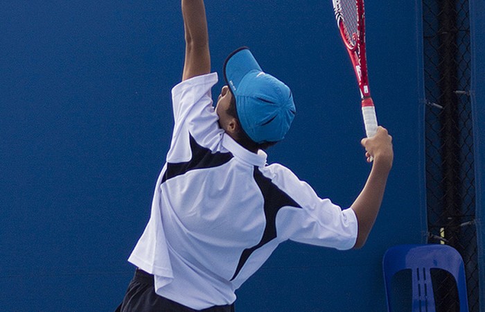 Richard Yang in action for Victoria in the Optus 14s teams final against New South Wales at Melbourne Park; Georgina Leeder