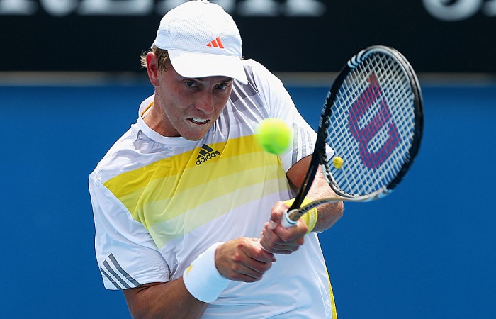 James Duckworth of Australia plays a backhand in his second round match against Blaz Kavcic of Slovenia during day four of the 2013 Australian Open at Melbourne Park on January 17, 2013 in Melbourne, Australia; Getty Images