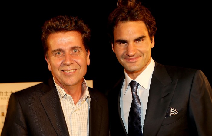 ATP Executive Chairman & President Brad Drewett poses for photographers with Roger Federer of Switzerland during a reception for the Shanghai Rolex Masters at the Hilton Hotel on October 8, 2012 in Shanghai, China; Getty Images