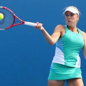 Tammi Patterson of Australia plays a forehand during her match against Zuzana Ondraskova of Czech Republic during Australian Open qualifying at Melbourne Park on January 10, 2013 in Melbourne, Australia; Getty Images