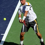 Lleyton Hewitt plays a backhand against John Isner in the second round of the BNP Paribas Open at Indian Wells 6-7(8) 6-3 6-4; Getty Images