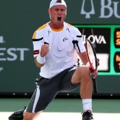 Lleyton Hewitt celebrates his three-set victory over John Isner in the second round of the BNP Paribas Open; Getty Images