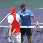 Colin Ebelthite (R) shakes hands with Jonathon Cooper after winning the men's singles title at the City of Ipswich Tennis International; Tennis Australia