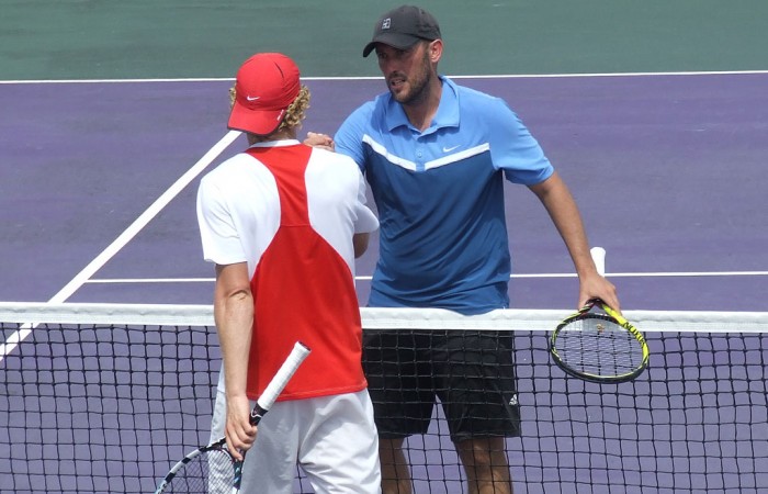 Colin Ebelthite (R) shakes hands with Jonathon Cooper after winning the men's singles title at the City of Ipswich Tennis International; Tennis Australia