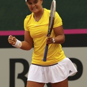 Ash Barty of Australia celebrates a point against Stefanie Voegele of Switzerland in their Fed Cup reverse singles tie at Tennis Club Chiasso; Getty Images