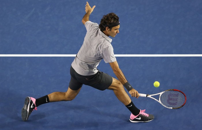 Roger Federer plays a volley during Australian Open 2013; Getty Images