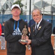 Gallipoli Youth Cup boys' champion Mitchell Pritchard (L) with veteran Turgut Kacmaz; Tennis Australia