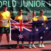 The Australian girls team of (L-R) captain Simon Youl, Destanee Aiava, Seone Mendez and Jaimee Fourlis pose for photos after winning the Asia/Oceania qualifying event in Kuching, Malaysia; Tennis Australia