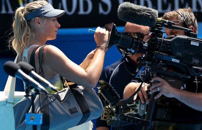 Maria Sharapova signs the camera at Australian Open 2013. GETTY IMAGES