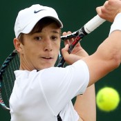 Andrew Harris in action during the 2012 Wimbledon Championships boys' singles event; Getty Images