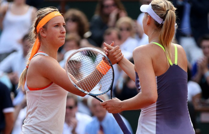Maria Sharapova (R) shakes hands at the net with Victoria Azarenka after winning their 2013 French Open semifinal at Roland Garros; Getty Images