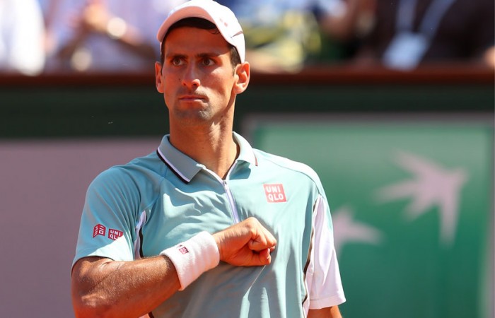 Novak Djokovic in action during the 2013 French Open at Roland Garros in Paris, France; Getty Images