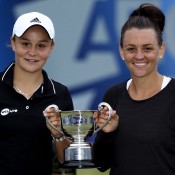 Ash Barty (L) and Casey Dellacqua (R) pose with the trophy after defeating Cara Black and Marina Erakovic to win the doubles title at the AEGON Classic in Birmingham, England; Getty Images